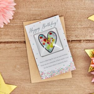 Birthday glass heart token on card with envelope